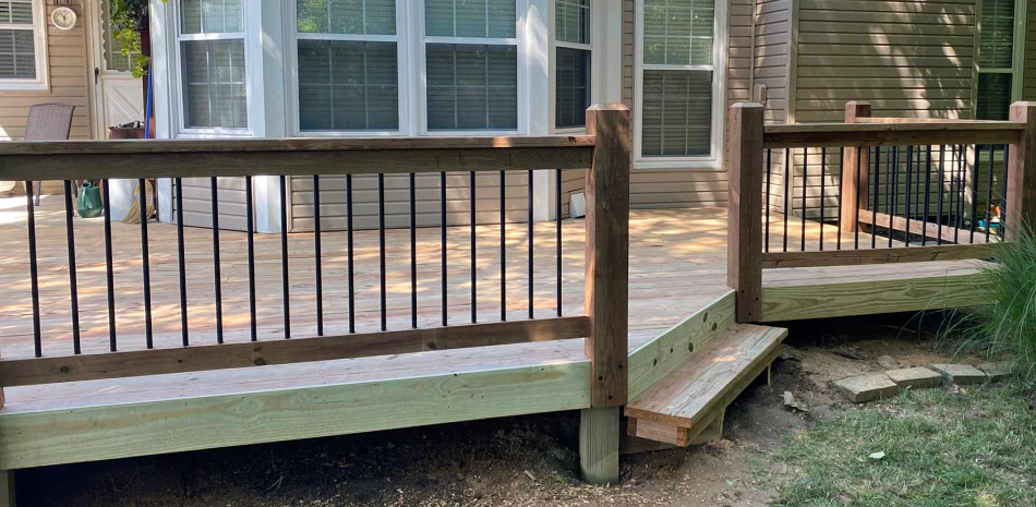 deck with wooden railings